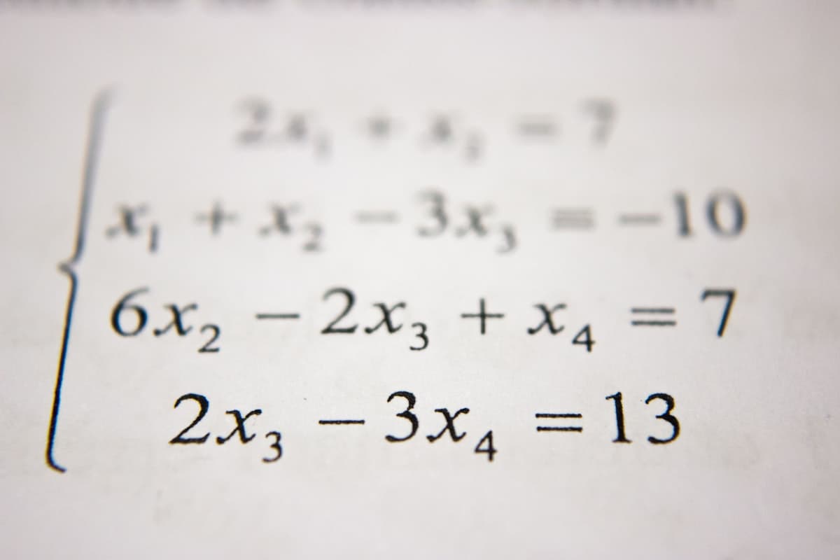 Notebook and study materials on a desk — spaced repetition system for French vocabulary